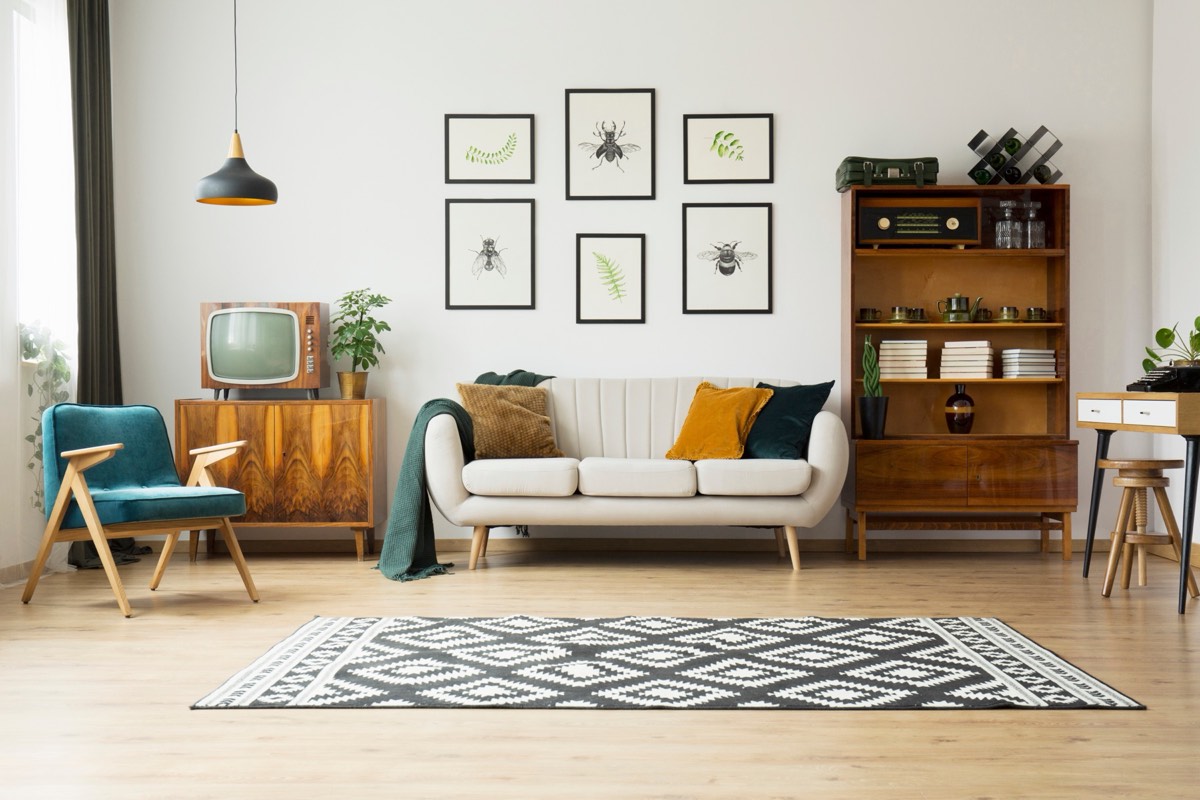 A vintage television set glowing in a darkened room