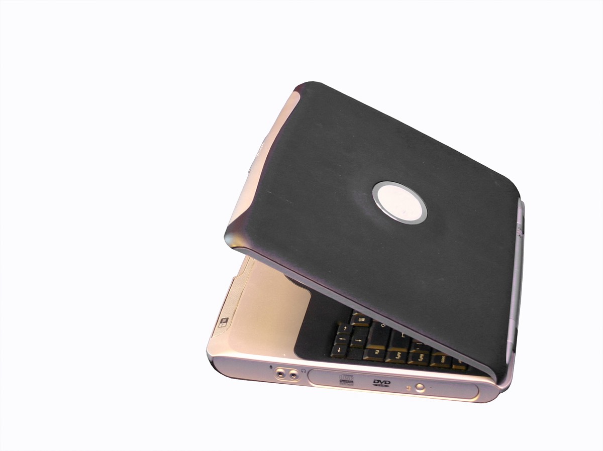 A laptop being placed into a sealed forensic evidence container