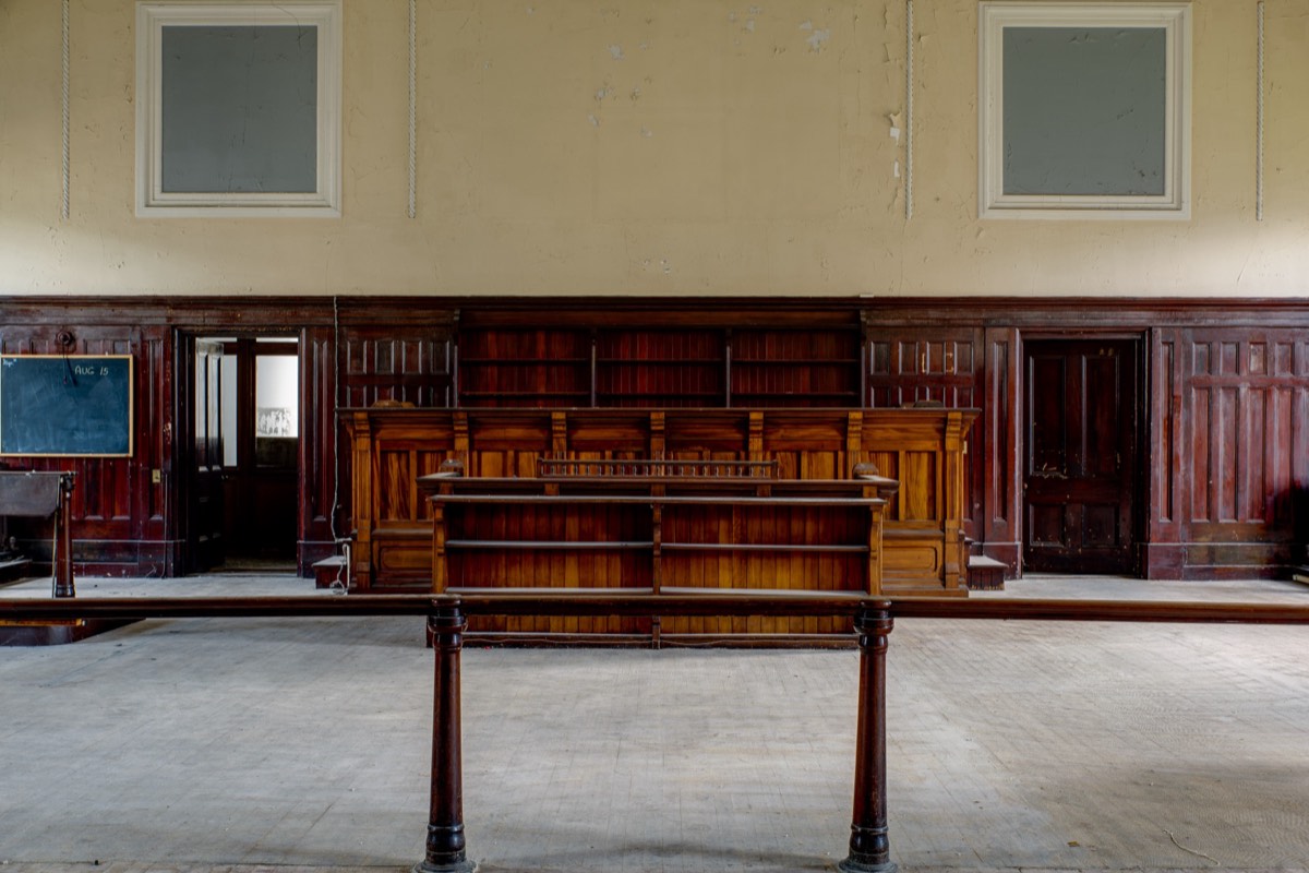 A jury box in an empty courtroom