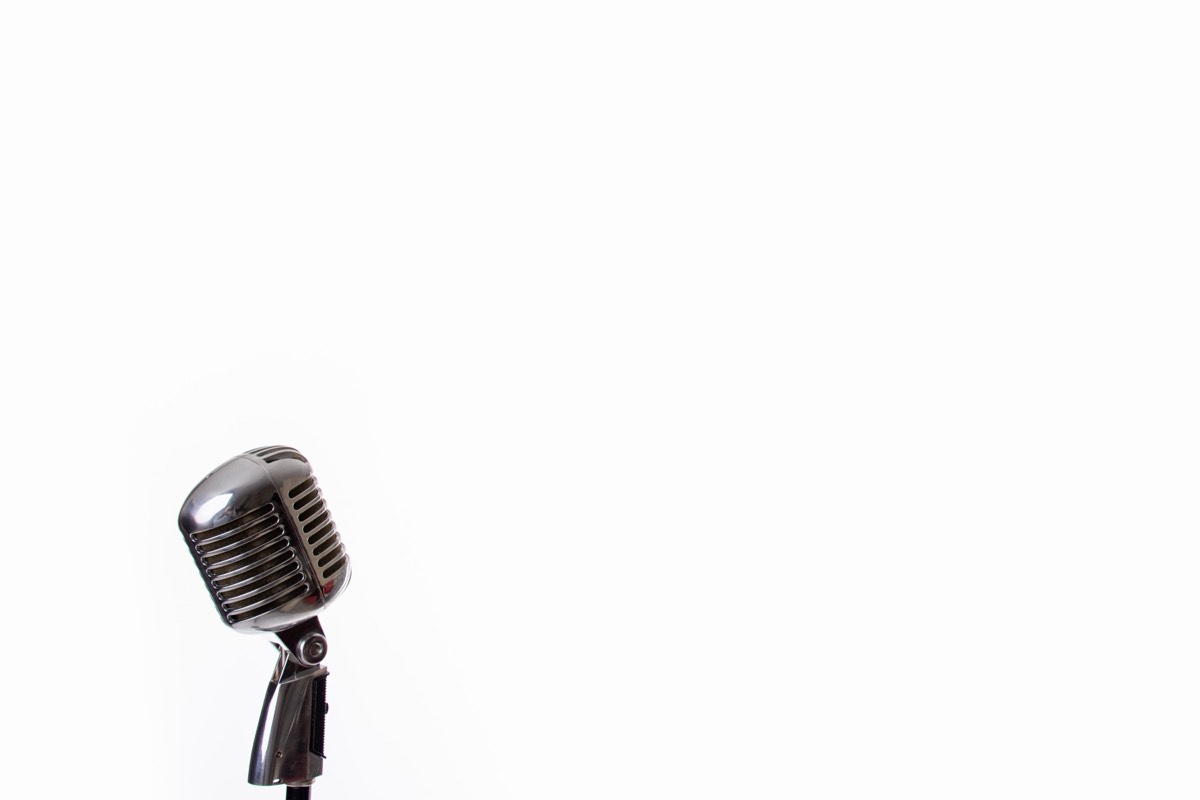 Vintage microphone in a recording studio under warm light